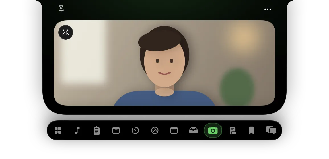 NotchDude Mirror showing a live camera preview in the open notch, with the flip button in the top-left corner